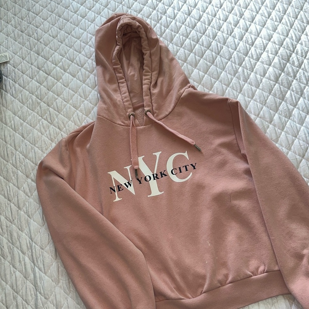 Pink hoodie with “New York City” stamp